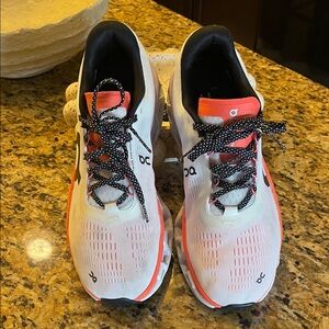 On Running Men’s White and Orange Athletic Shoes